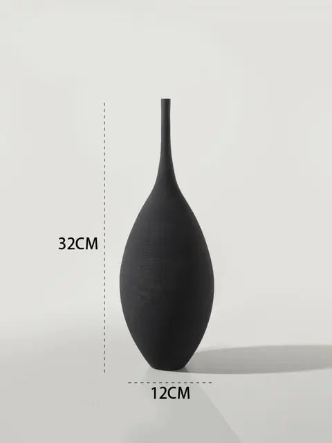 he M-sized Ceramic & Porcelain Tabletop Vase